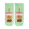 Pair of pastel green crew socks featuring a whimsical illustration of happy boba tea cups with tapioca pearls. 