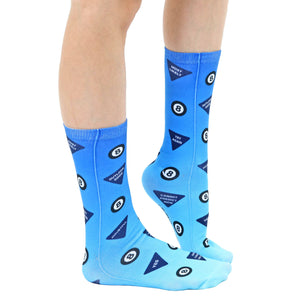 A pair of blue socks with a pool ball eight ball pattern. The socks have the words 