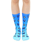 Pair of crew socks in blue ombre, featuring a Magic 8 ball design with phrases like 'Outlook Good' and 'Try Again'. [lf]
