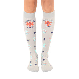 frontline hero knee-high socks show support for first responders in gray with blue, red, and orange plus signs, "frontline hero" and "saving lives" text  