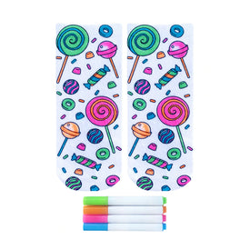 white crew socks featuring black outlined candy designs with included green, pink, blue, and orange markers for coloring.   
