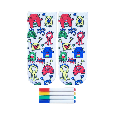 Pair of white ankle socks with colorful cartoon monsters and 'Rawr!' text. Includes four fabric markers.