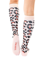 Back view of the leopard print knee-high socks, showcasing the 'Living Royal' logo on the heel. [lf]