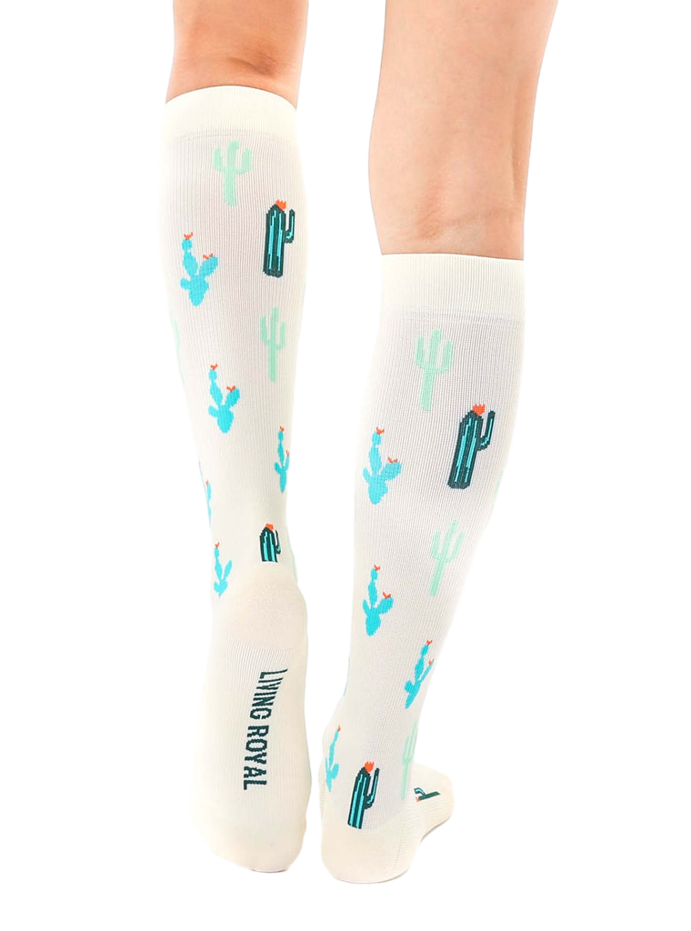 Back view of the socks, highlighting the Living Royal logo and full cactus print. [lf]