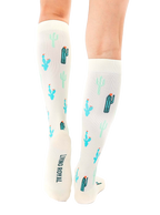 Back view of the socks, highlighting the Living Royal logo and full cactus print. [lf]