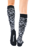 Back view of the black and silver paisley knee-high socks, showcasing the 'Living Royal' logo on the heel. [lf]