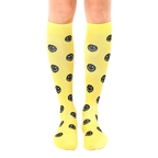 Pair of yellow knee-high socks with a repeating black smiley face pattern.  Fun and comfortable! [lf]