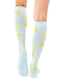 Back view of the lemon knee-high socks, showcasing the full pattern on both socks. [lf]
