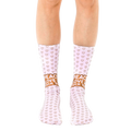 A pair of women's crew socks in light pink.  Tiny hearts cover the socks, with a 'Peace Love Fuck You' message near the ankle in a light brown color. [lf]