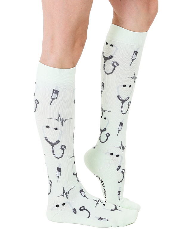 Lifestyle shot of a person wearing a mint green Pulse sock. Shows the sock's length and design on the leg. [lf]