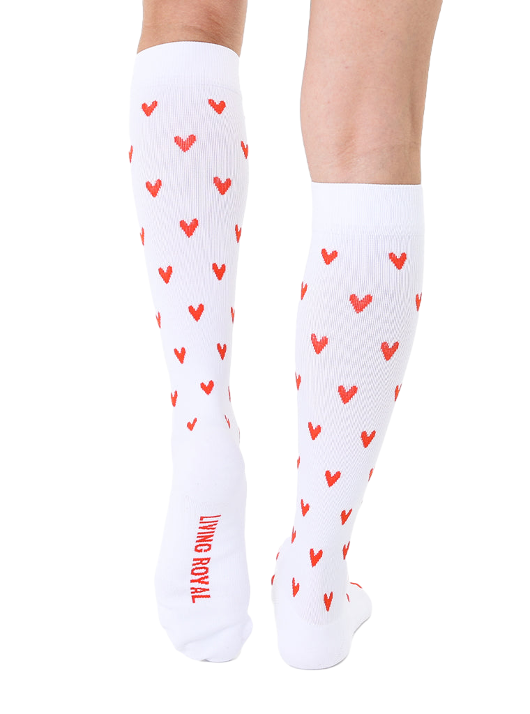Rear view of the socks, showcasing the 'Living Royal' logo on the back in red. [lf]