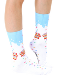 Lifestyle shot of a person's legs wearing the Cereal Killer socks.  Shows the socks on a foot and lower leg. [lf]