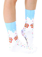 Lifestyle shot of a person's legs wearing the Cereal Killer socks.  Shows the socks on a foot and lower leg. [lf]