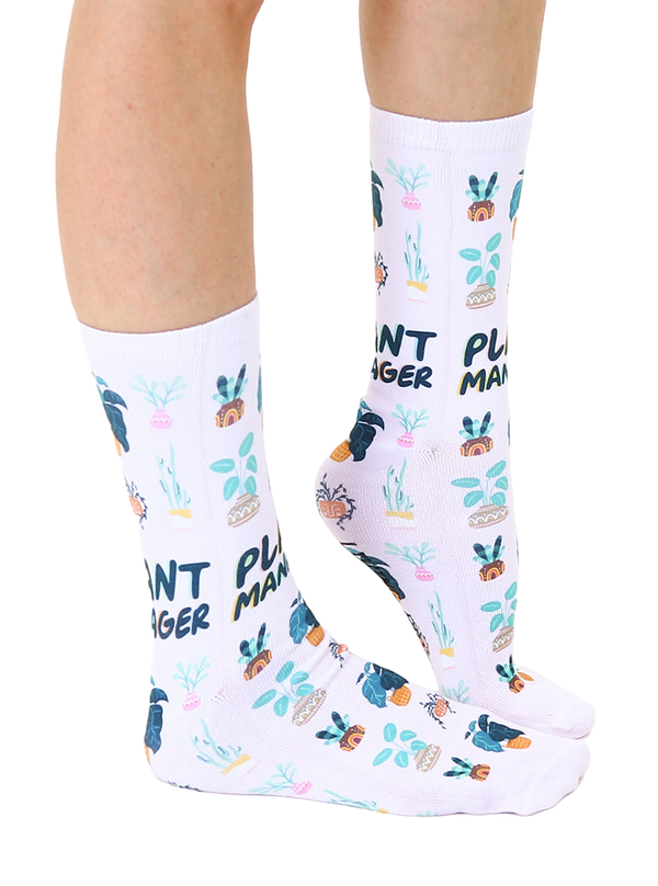 Lifestyle shot showing the Plant Manager socks on a person's feet, showcasing how they look when worn. [lf]