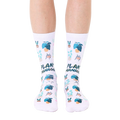 White crew socks with a repeating pattern of potted plants and the text 'Plant Manager' in teal and pink. [lf]