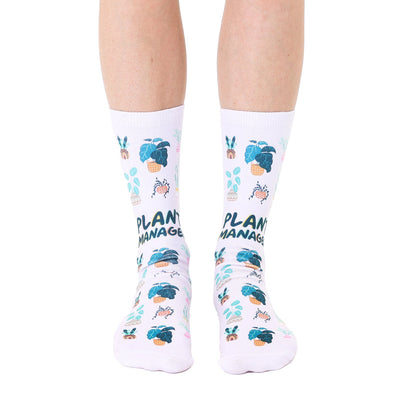 plant manager gardening socks in green and blue with black text.  