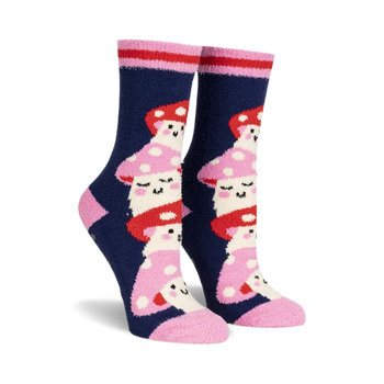 pair of socks with a front view of the socks.  the socks are navy blue with pink and red mushroom designs.  the mushrooms have white polka dots and happy faces.