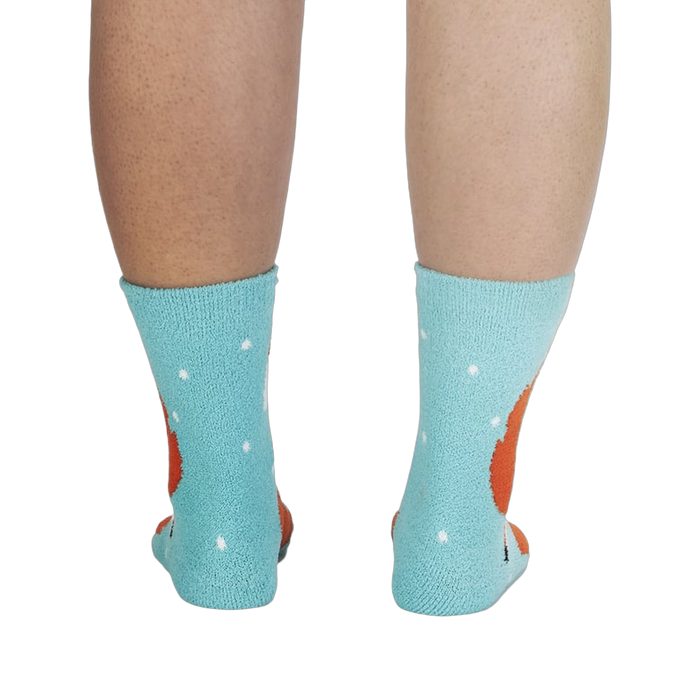 Back view of the fox slipper socks on a person's legs.