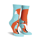 Fuzzy crew socks in teal and orange, featuring a cute fox design with small white dots. 