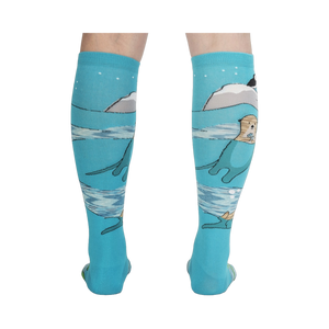 Back view of the 'Plays Well With Otters' knee-high socks highlighting the full design, including the otters and icebergs.