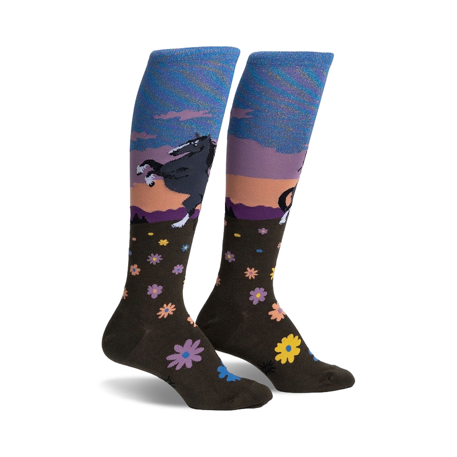 Pair of women's knee-high socks.  Olive green with a sunset scene, a dark horse, and scattered flowers. Blue and purple iridescent top cuff.