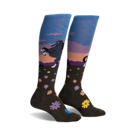 dark brown floral pattern knee-high socks for women feature a leaping black horse against a sunset background. horse-themed socks.  