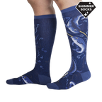 Lifestyle photo showing the 'Once Upon a Narwhal Shimmer' knee-high socks on a person's legs.