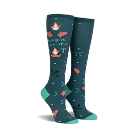  dark teal knee-high socks with flames, hearts, spatulas, and "drop it like it's hot" text for women.    
