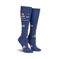 Pair of navy blue knee-high socks with a whimsical design.  Features small houses, trees, and a burning house with the text 'Bless This Mess'.