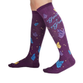 Lifestyle shot showcasing the 'You're a Gem' knee-high socks on a person's legs, showing off the design and fit.