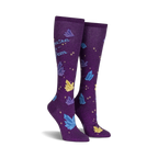 Pair of purple knee-high socks with a scattered crystal design and the text 'You're a Gem'.  Crystals are blue, yellow, and sparkle.