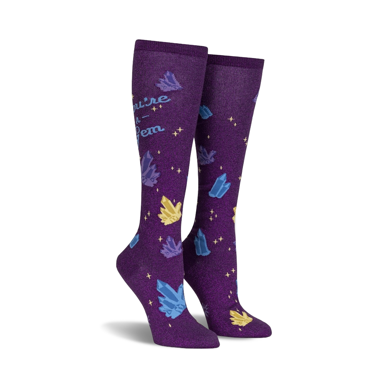 Pair of purple knee-high socks with a scattered crystal design and the text 'You're a Gem'.  Crystals are blue, yellow, and sparkle.