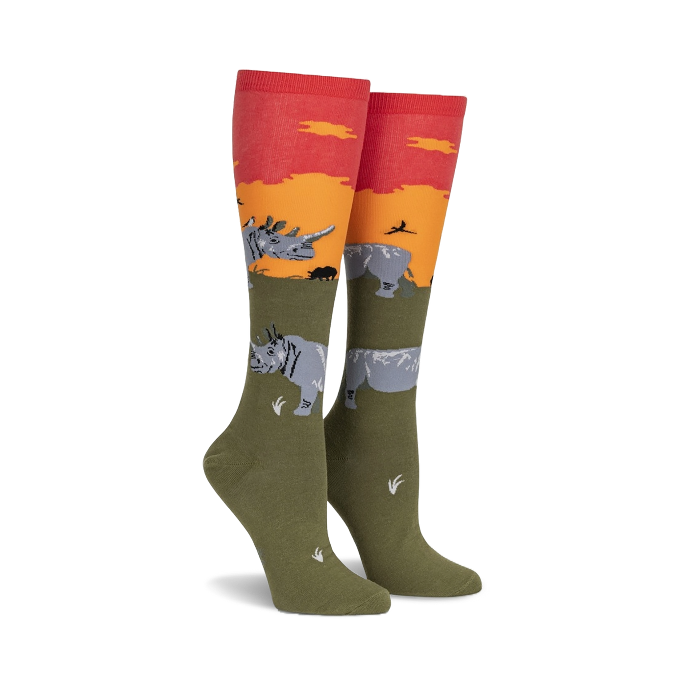 Pair of knee-high socks in olive green, orange, and red.  Design features rhinos against a sunset backdrop.