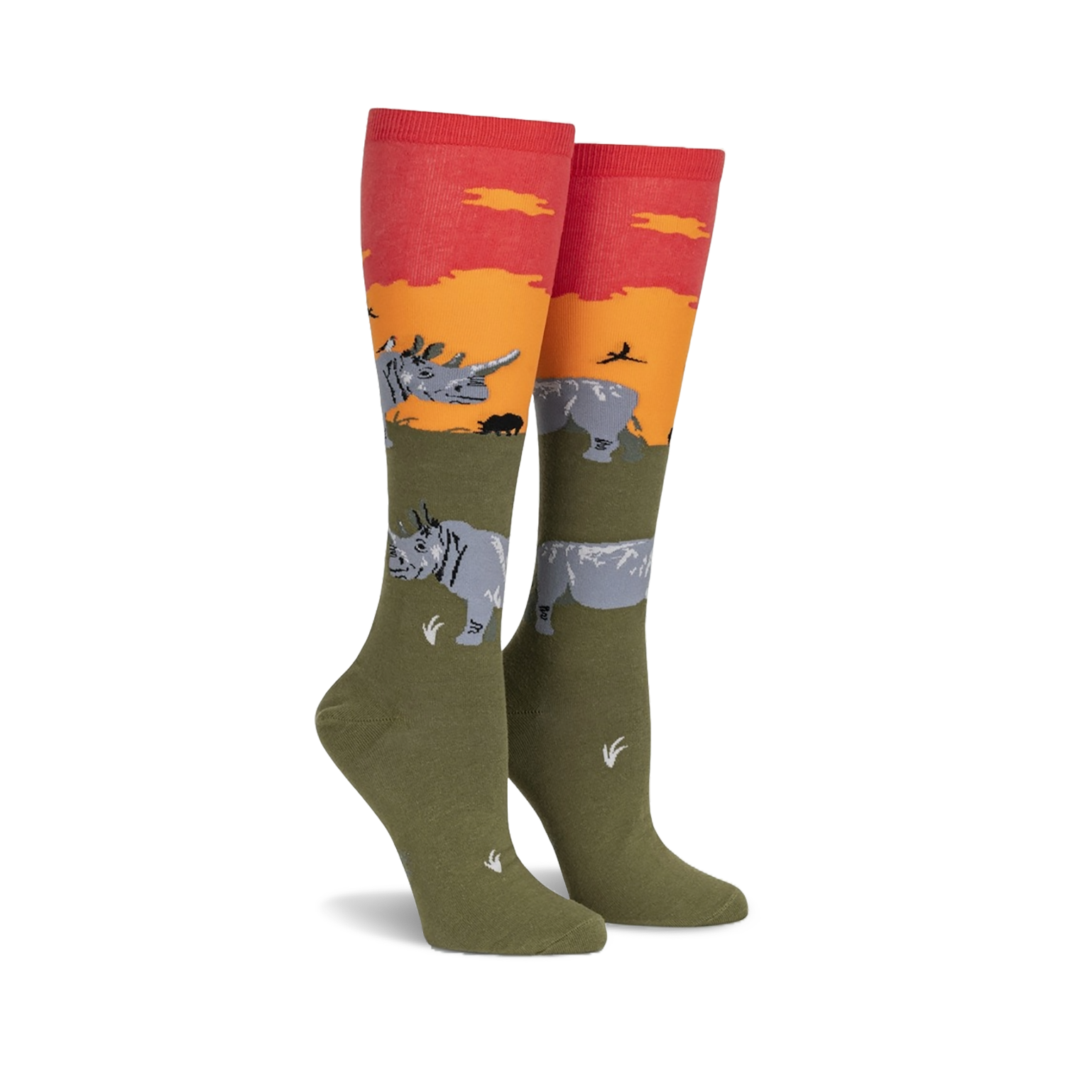Pair of knee-high socks in olive green, orange, and red.  Design features rhinos against a sunset backdrop.