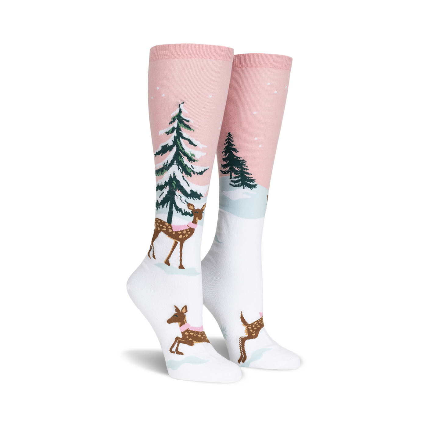 Pair of women's knee-high socks. Pink and white with a winter scene: deer wearing scarves, snowy trees. 