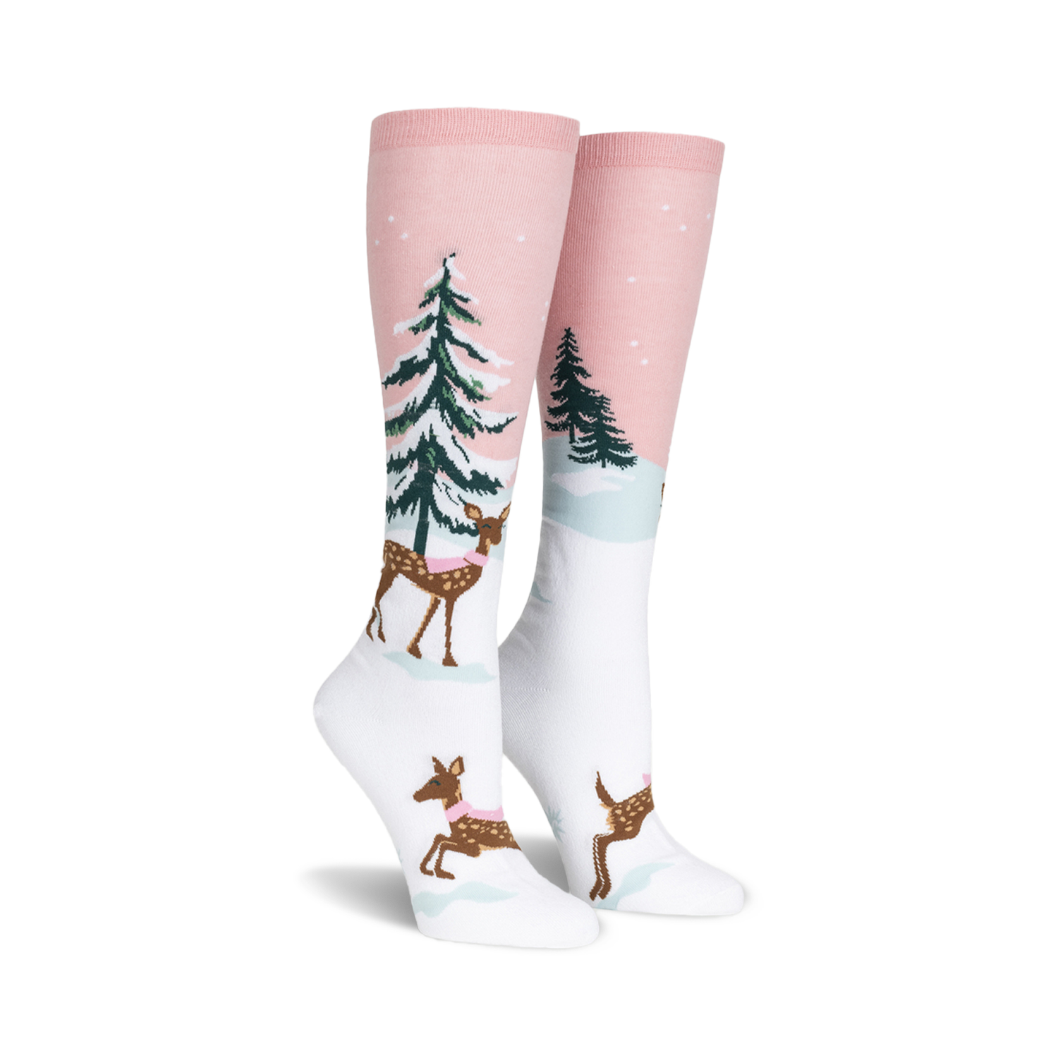 Pair of women's knee-high socks. Pink and white with a winter scene: deer wearing scarves, snowy trees. 