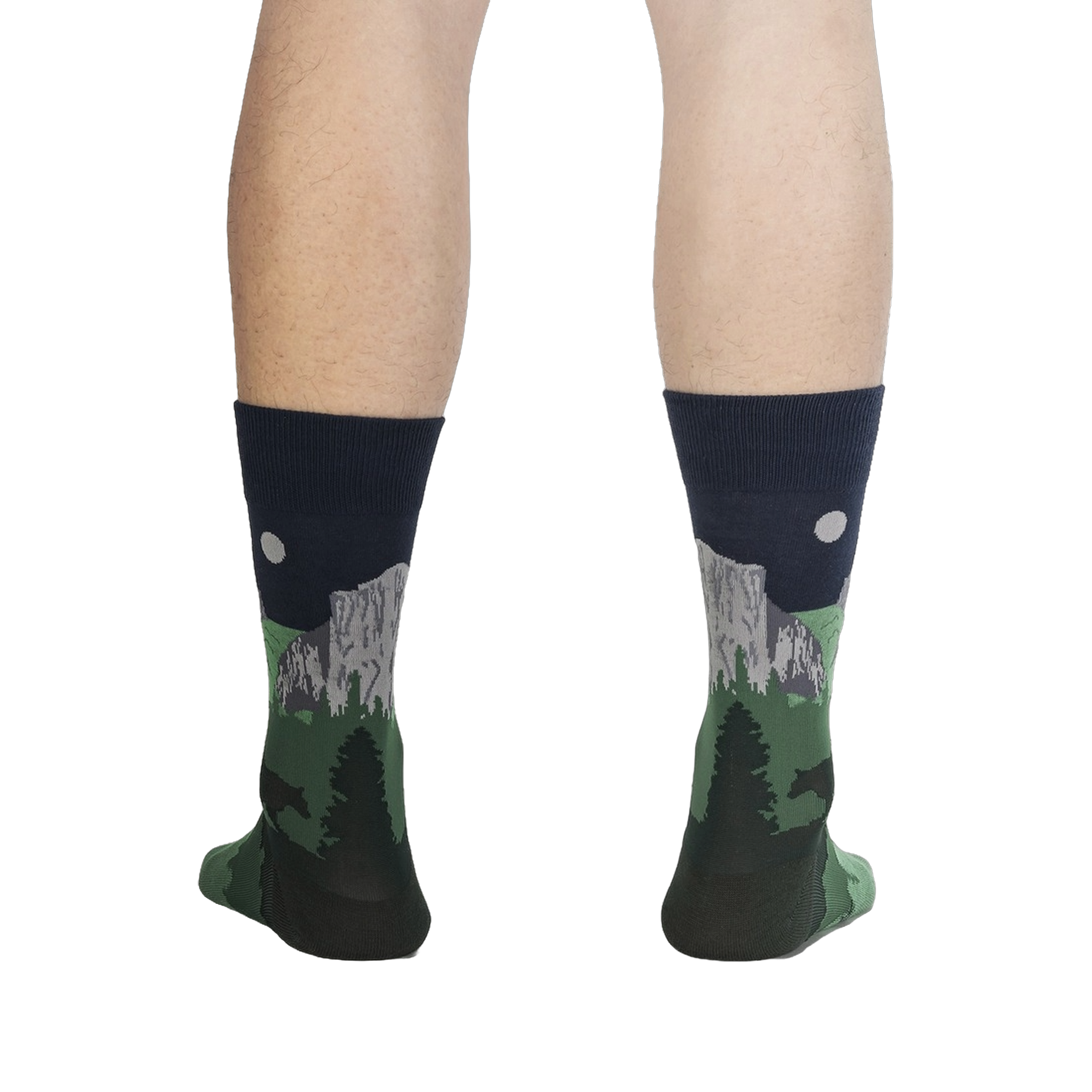 Rear view of the Half Dome Yosemite socks on a person's legs against a black background.  The socks' design is visible from the back.