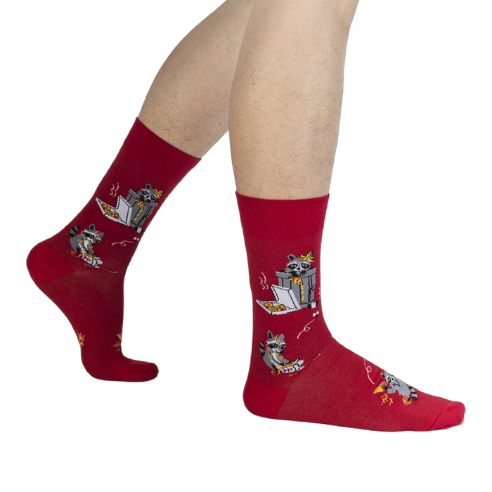 Lifestyle shot of a person's legs wearing the red Trash Panda socks.