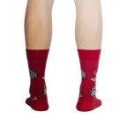 Back view of the red Trash Panda socks, showcasing the design on the back.