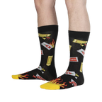 Lifestyle shot showing the 'Extra Hot' socks on a person's legs. The socks' design is clearly visible.