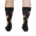 Rear view of the 'Extra Hot' socks on a person's legs. The back of the socks shows the full design.