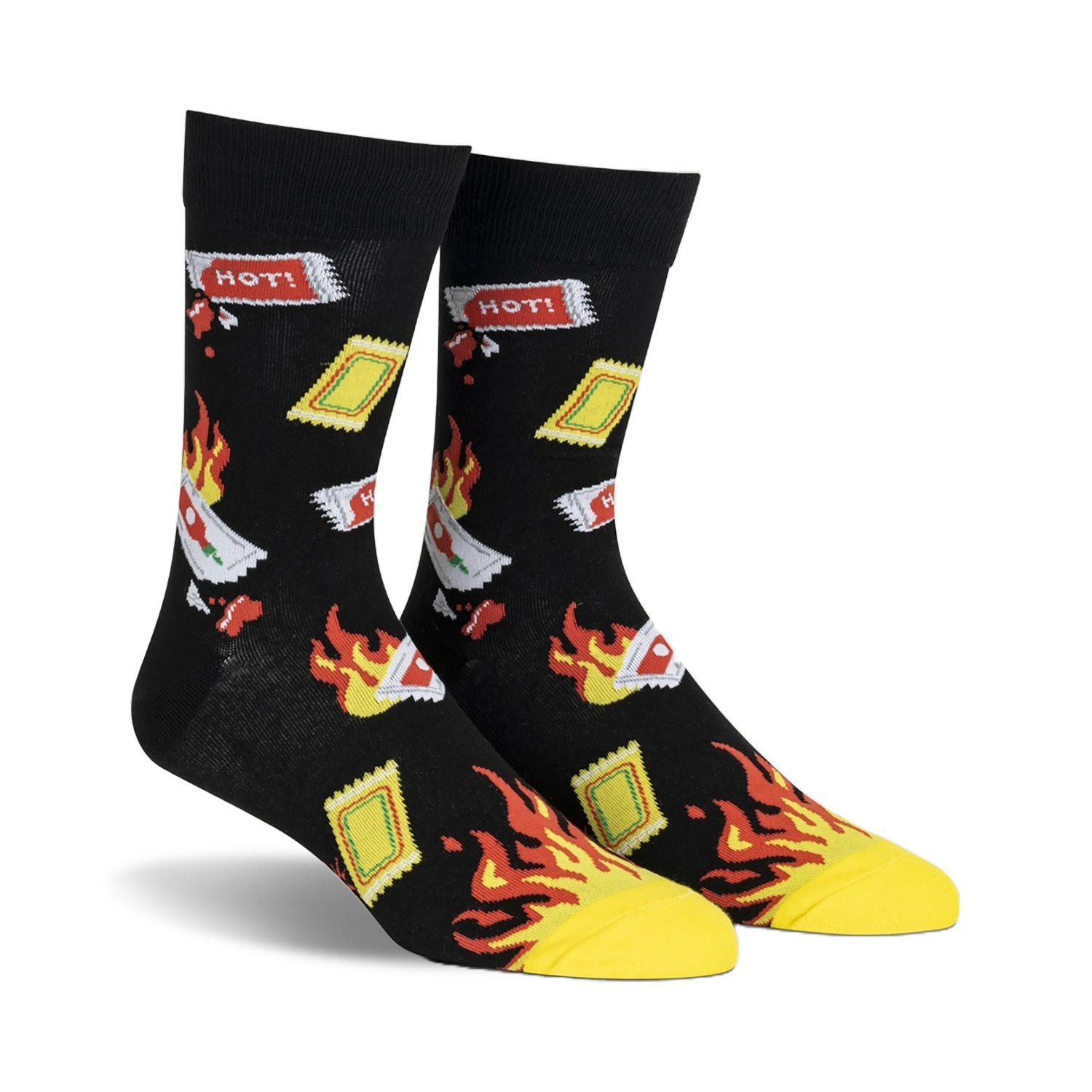 Pair of black crew socks with a playful design of flaming hot sauce packets and yellow flames.  'HOT!' text is visible on some packets.
