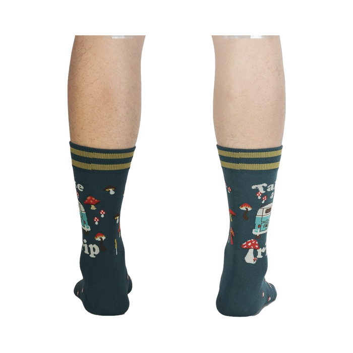 Rear view of a person wearing the teal 'Take a Trip' socks, displaying the back design