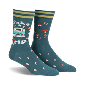 dark teal socks with red and white mushroom pattern, light blue van with "take a trip" text, yellow stripe and bumper, black wheels with white centers. men's crew length. camping theme.  