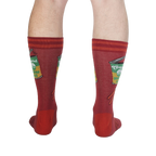 Rear view of a person's legs wearing the 'Opening Up A Can' socks, emphasizing the design's full appearance.