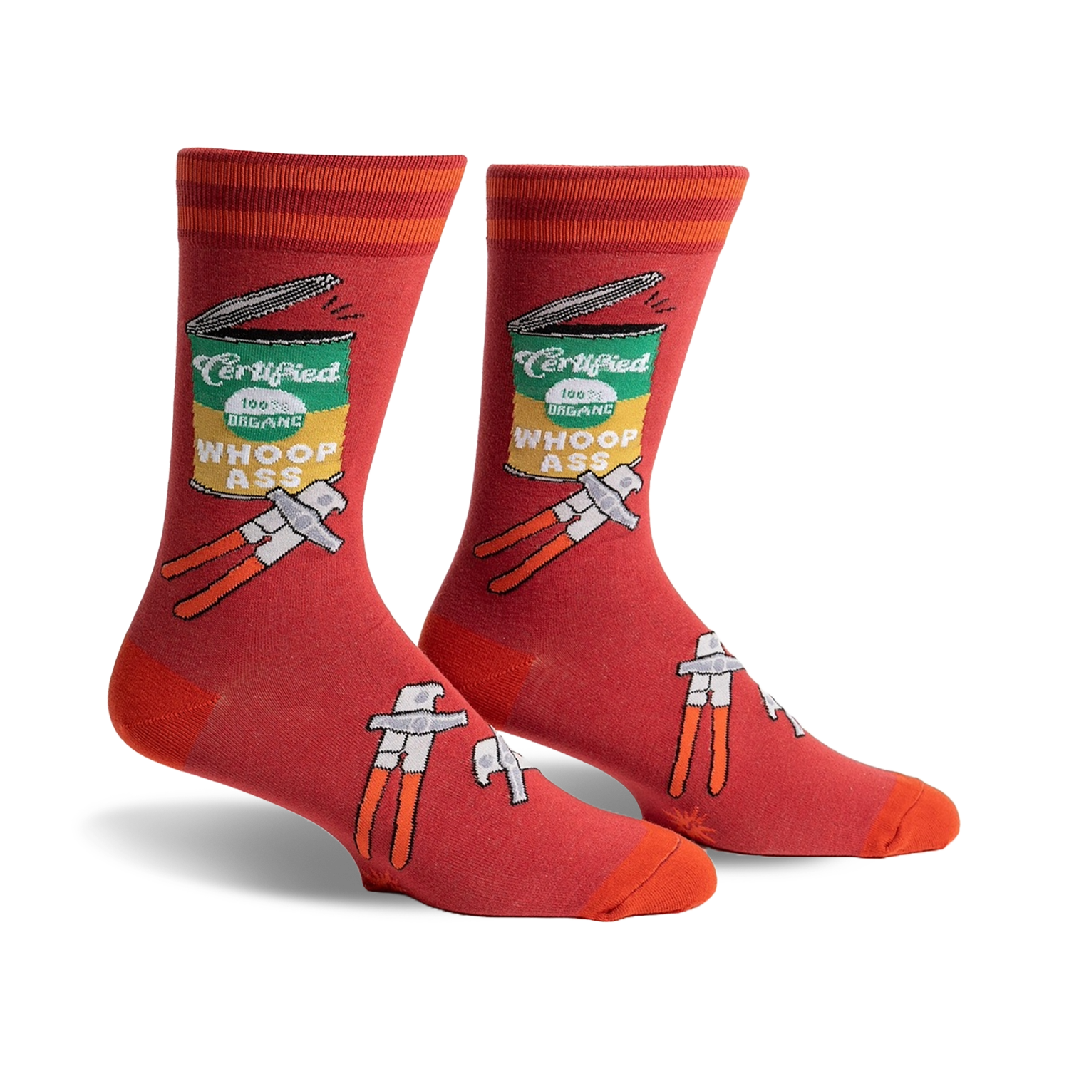 Pair of men's crew socks in red with an illustrated can of 'Whoop Ass' and tools.  Features orange stripes at the top.