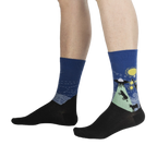 Lifestyle shot showing The Starry Flight socks on a person's legs, highlighting the fit and design.