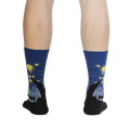 Rear view of a person wearing The Starry Flight socks, showcasing the sock's design from the back.