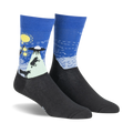 Pair of crew socks in navy blue and black, depicting a whimsical UFO scene against a starry night sky.