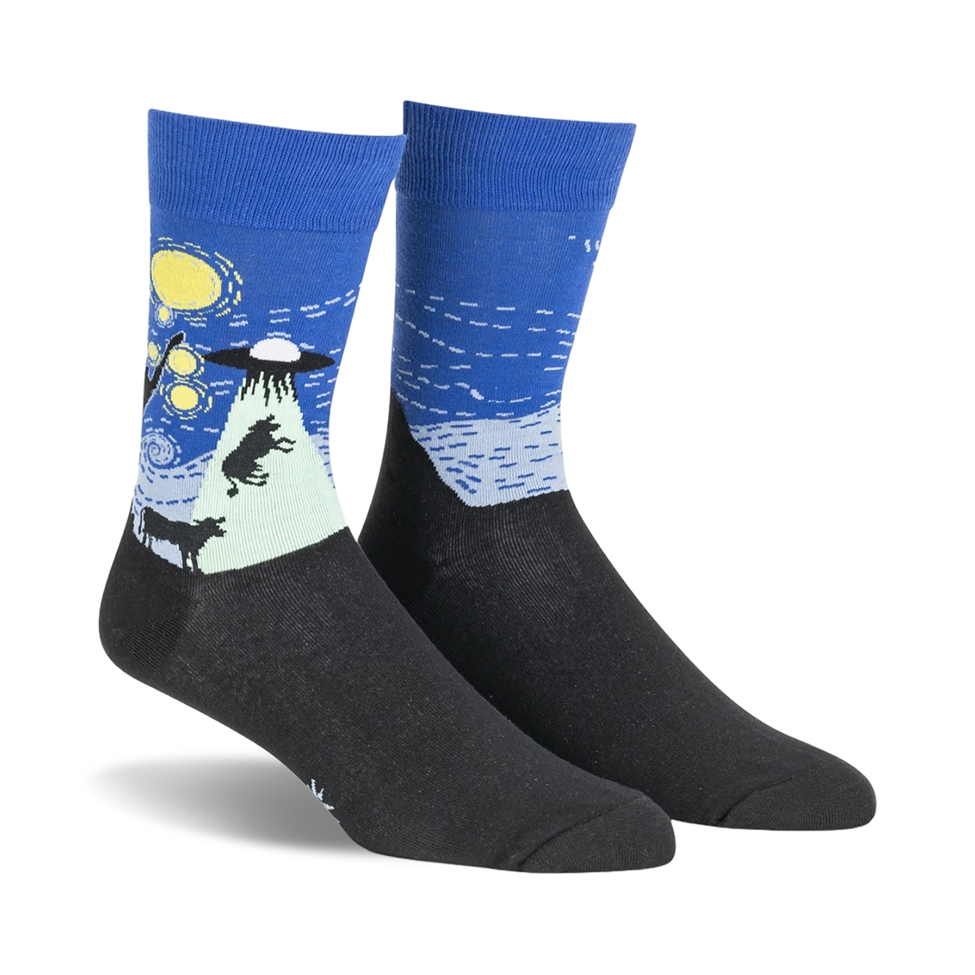 Pair of crew socks in navy blue and black, depicting a whimsical UFO scene against a starry night sky.